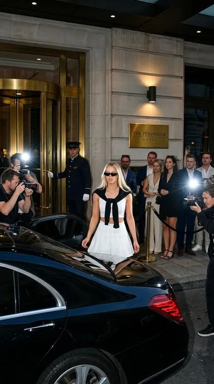 Paparazzi AI Hotel Entrance Flash Moment example